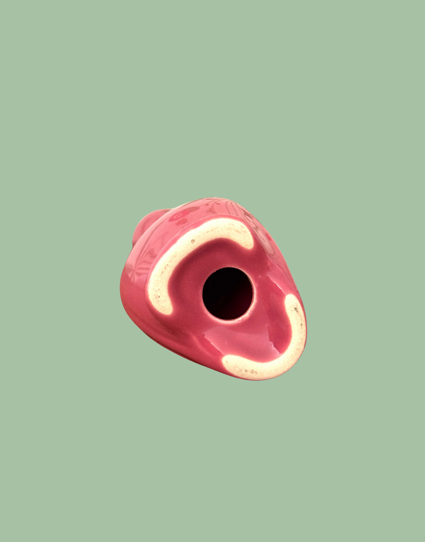Underside view of pink collectable pie bird 