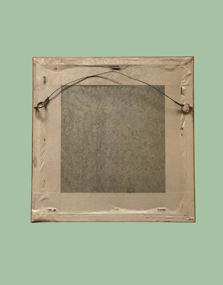 Reverse of vintage cottagecore embroidery frame showing wooden backing and hanging fixture detail
