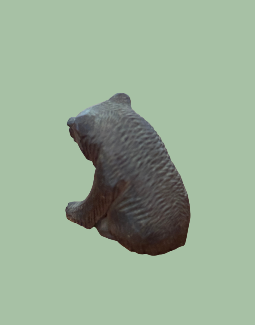 Vintage carved wooden bear ornament freestanding sitting figurine from behind.