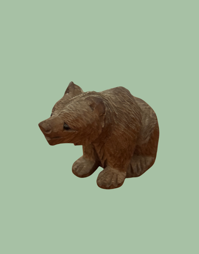 Antique Black Forest bear seated figure in light wood finish