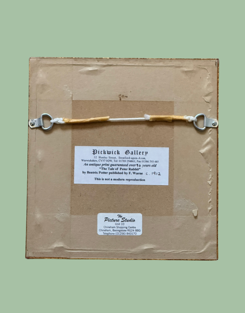 Reverse side of antiue framed Beatrix Potter nursery decor