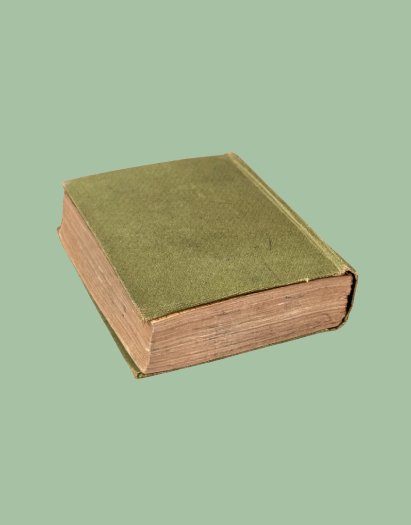 A vintage hardcover book with a muted olive green cloth cover and worn, tan-beige paper edges, shown at an angle against a solid sage green background.