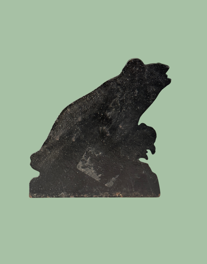 Back of characterful vintage cast iron frog doorstep front facing ornament