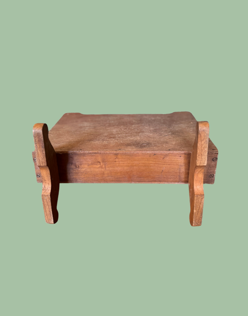 Underside view of wooden magazine rack