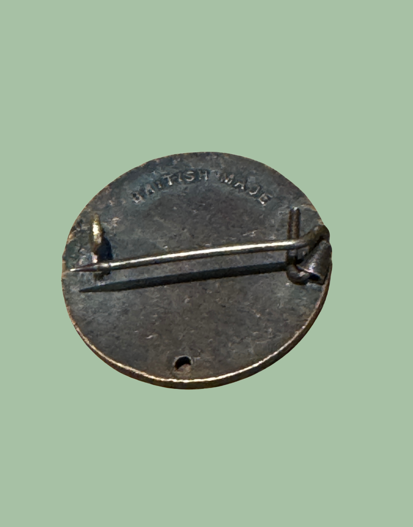 1930s British Pre War Cadbury Brass Collectable Badge from reverse 