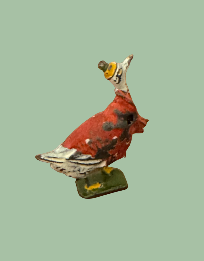 small scale hand painted bird figurine