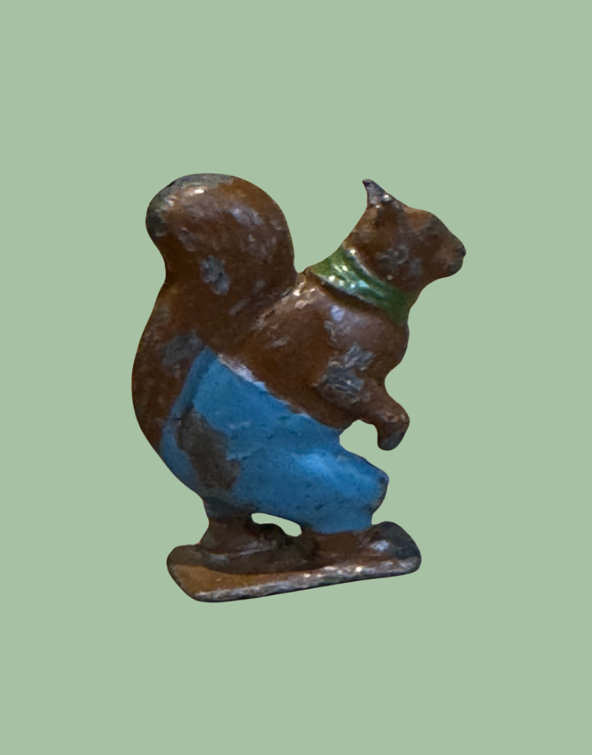 Side View of brightly hand painted lead Squirrel charter figure