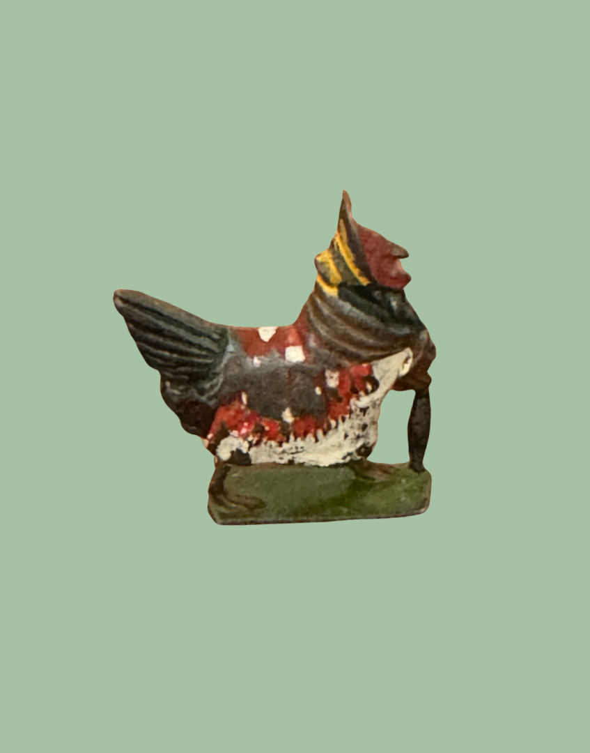 Henrietta ‘Fussy Feathers’ Britains Ltd Collectable in fancy red and white dress and yellow bonnet