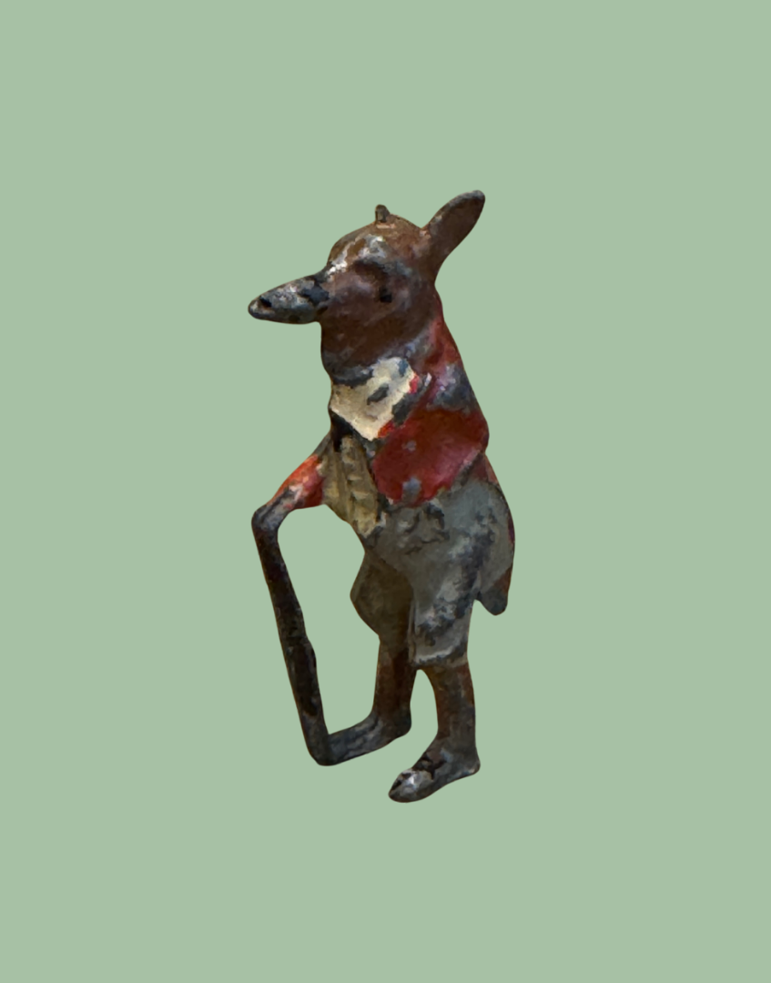 Close up of antique lead fox toy