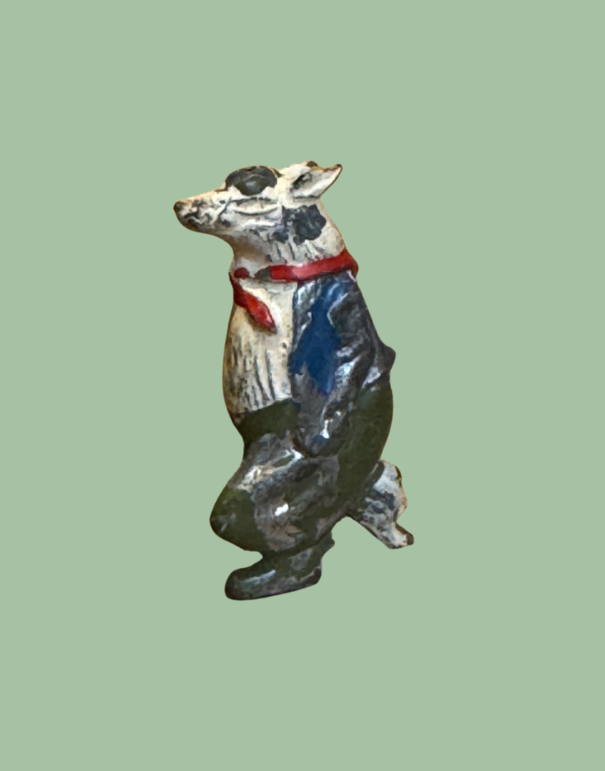 ‘Bill Badger’ hand painted white and black lead toy figure with red scarf and bue jacket