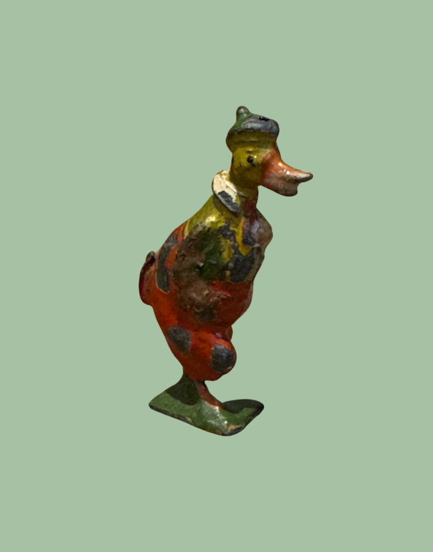Side View of Cheerful Dressed  1930s Cadbury Cococub Duck Character