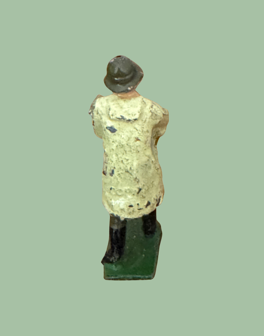 Back view of 1920s Britains Farmer Lead Farmyard Toy