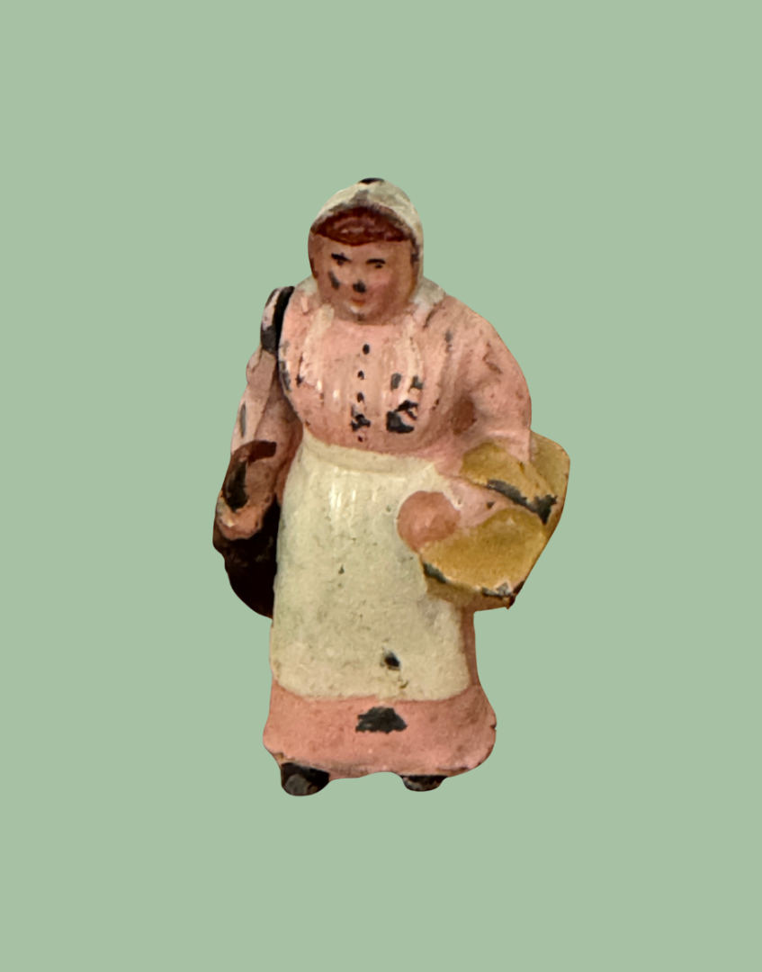 Original 1930s Britains Wife with Umbrella miniature lead figure wearing pink dress and carrying basket
