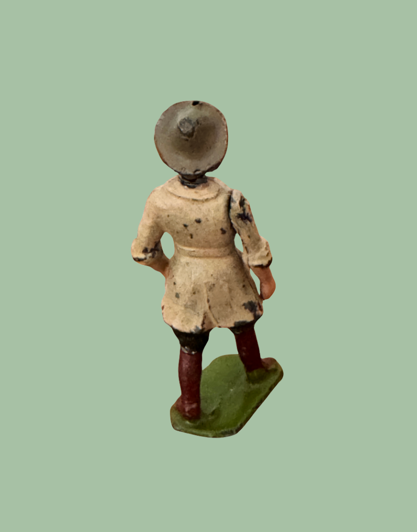 Reverse view of Britains Home Farm Series Land Girl vintage lead figure showing rear detailing and finish