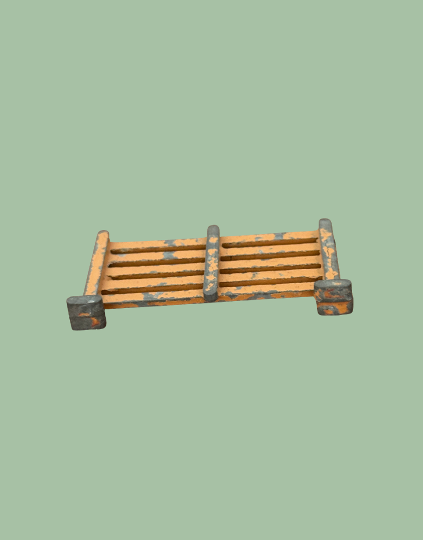 undersie view of britains farm lead painted gate toy