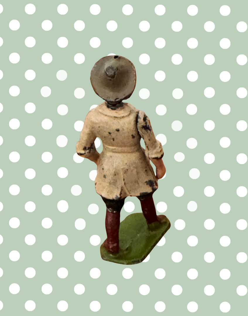 Reverse view of Britains Home Farm Series Land Girl vintage lead figure showing rear detailing and finish