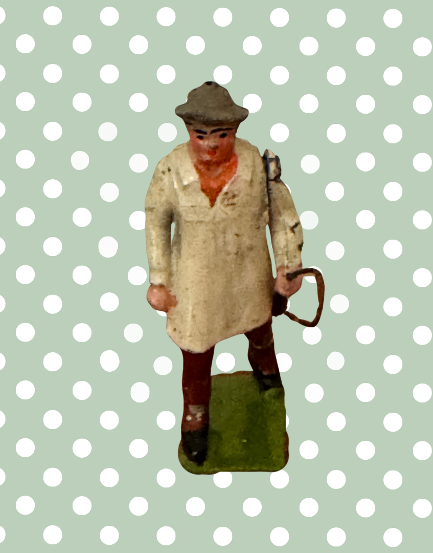 Original 1930s Britains Carter with Whip miniature farm figure wearing tan smock and country hat