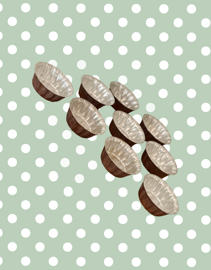 Collection of vintage aluminium star moulds displayed together showing the complete set and aged metal finish