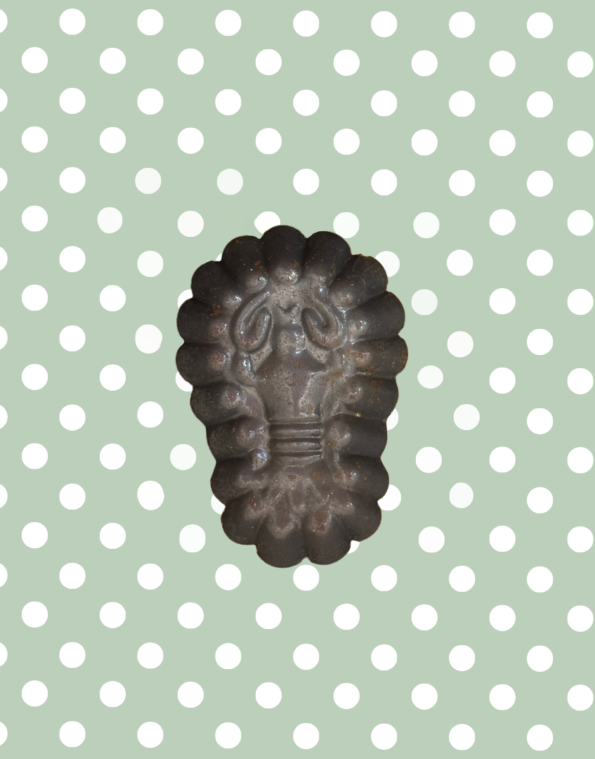 Reverse view of one vintage lobster shaped tinplate mould showing original metal construction and aged finish
