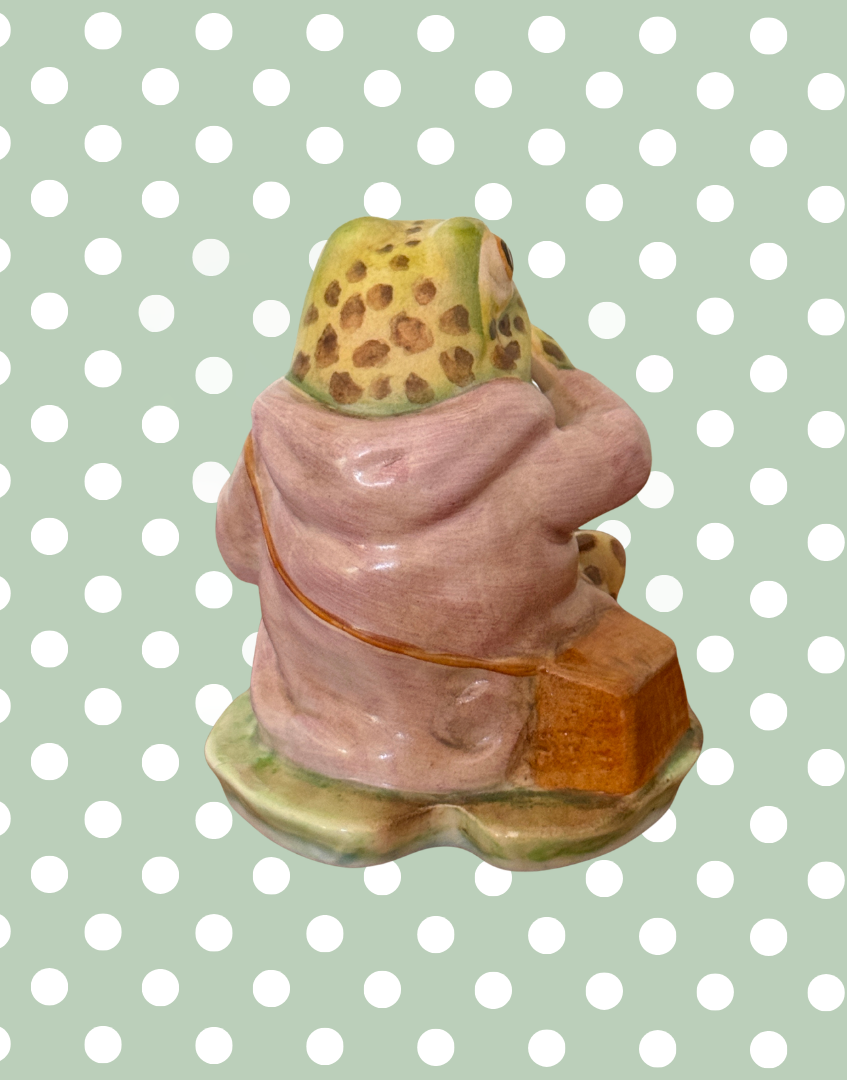 Rear view of Beswick Jeremy Fisher Beatrix Potter figurine showing the back of his lilac coat and detailed craftsmanship