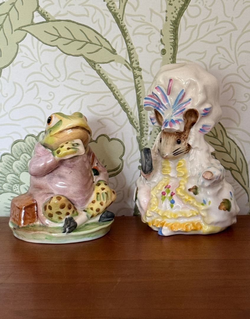 Vintage Beswick Jeremy Fisher and Lady Mouse Beatrix Potter figurines displayed together on a wooden shelf as part of a charming English pottery collection