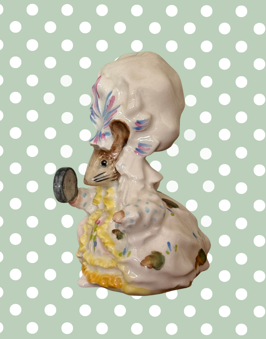 Side view of vintage Beswick Lady Mouse figurine showing hand-painted dress, bonnet and porcelain detailing