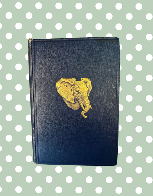 Antique 1927 Natural History Animals book with navy blue leather binding and gilt elephant cover detail