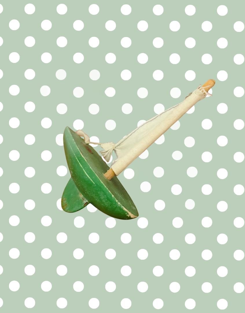 Rear underside view of the vintage green Star Yachts No. 0 pond yacht showing its original painted construction.