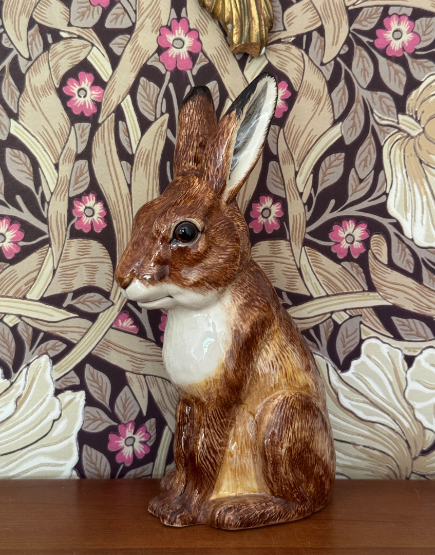 John Beswick Hare Moneybox Styled Against William Morris Pimpernel Wallpaper
