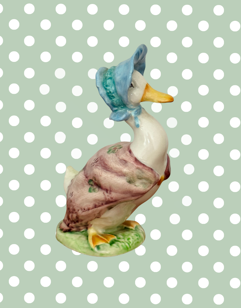 Vintage Jemima Puddle Duck Beswick figure viewed from the left side
