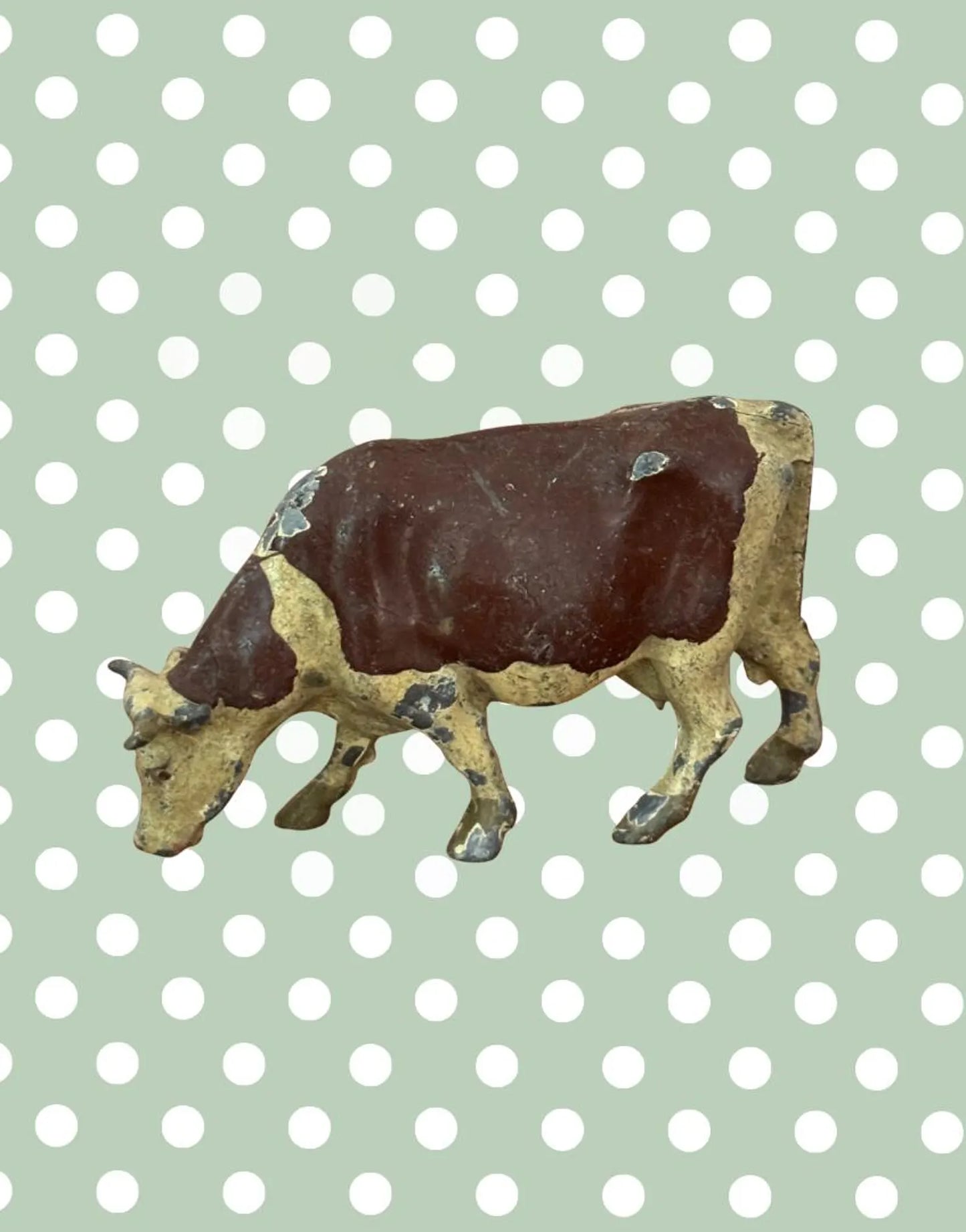 side view of hollow cast britains farm series cow lead figurine