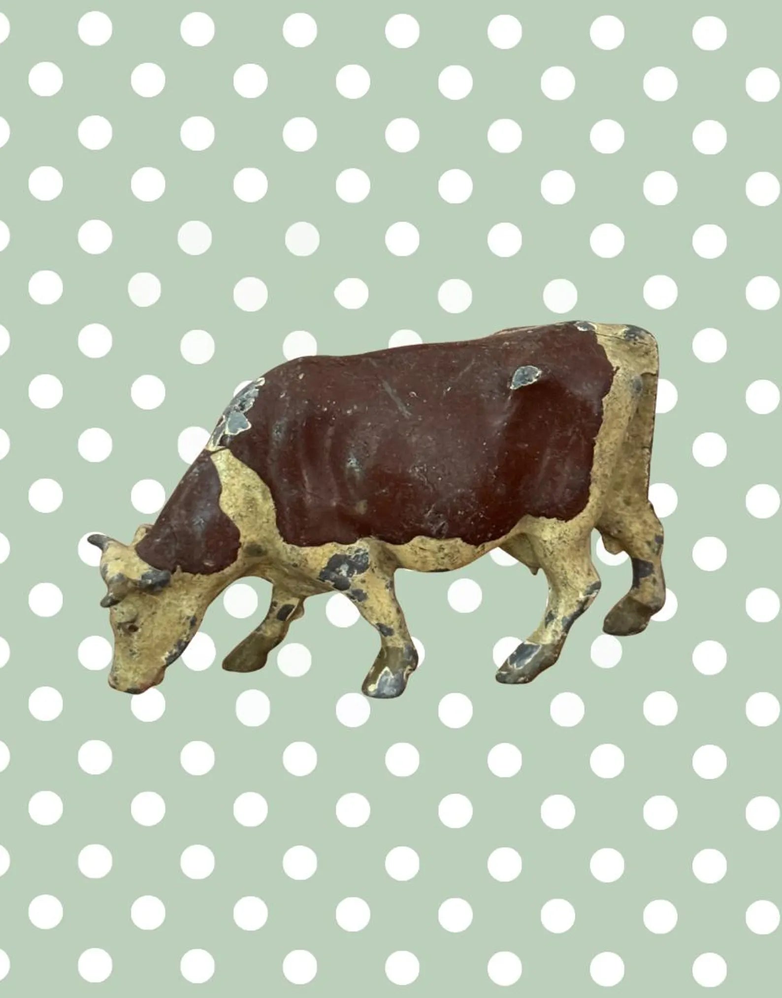 side view of hollow cast britains farm series cow lead figurine