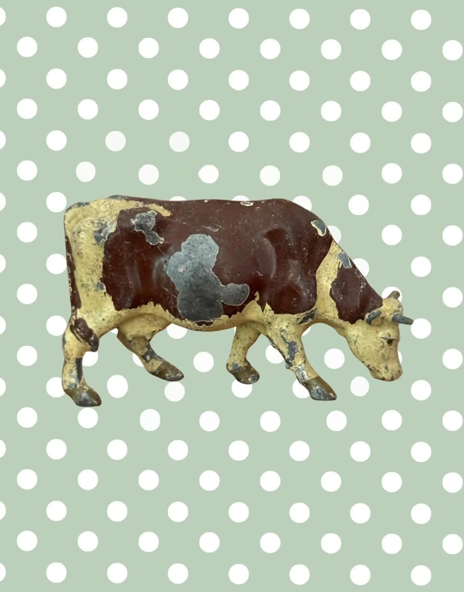 Small vintage cow lead figurine