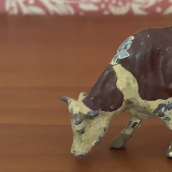 britains hand painted brown and beige lead cow farm toy collectable