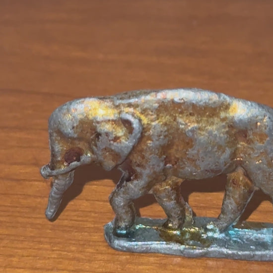 1950s Miniature Flat Silhouette Baby Elephant Figurine with Soft Pink-Gold Patina