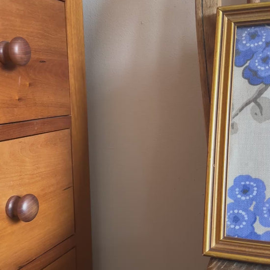 Pretty blue asian inspired floral wall art in gold vintage frame on antique wood chair