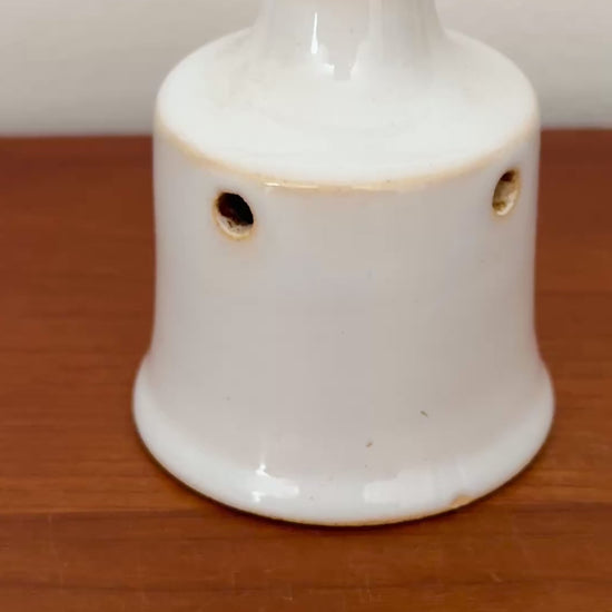 Traditional white glazed ceramic pie vent for baking and kitchenalia collections.