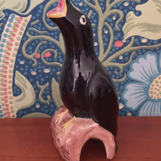 Artone British pottery glossy black bird pie funnel 