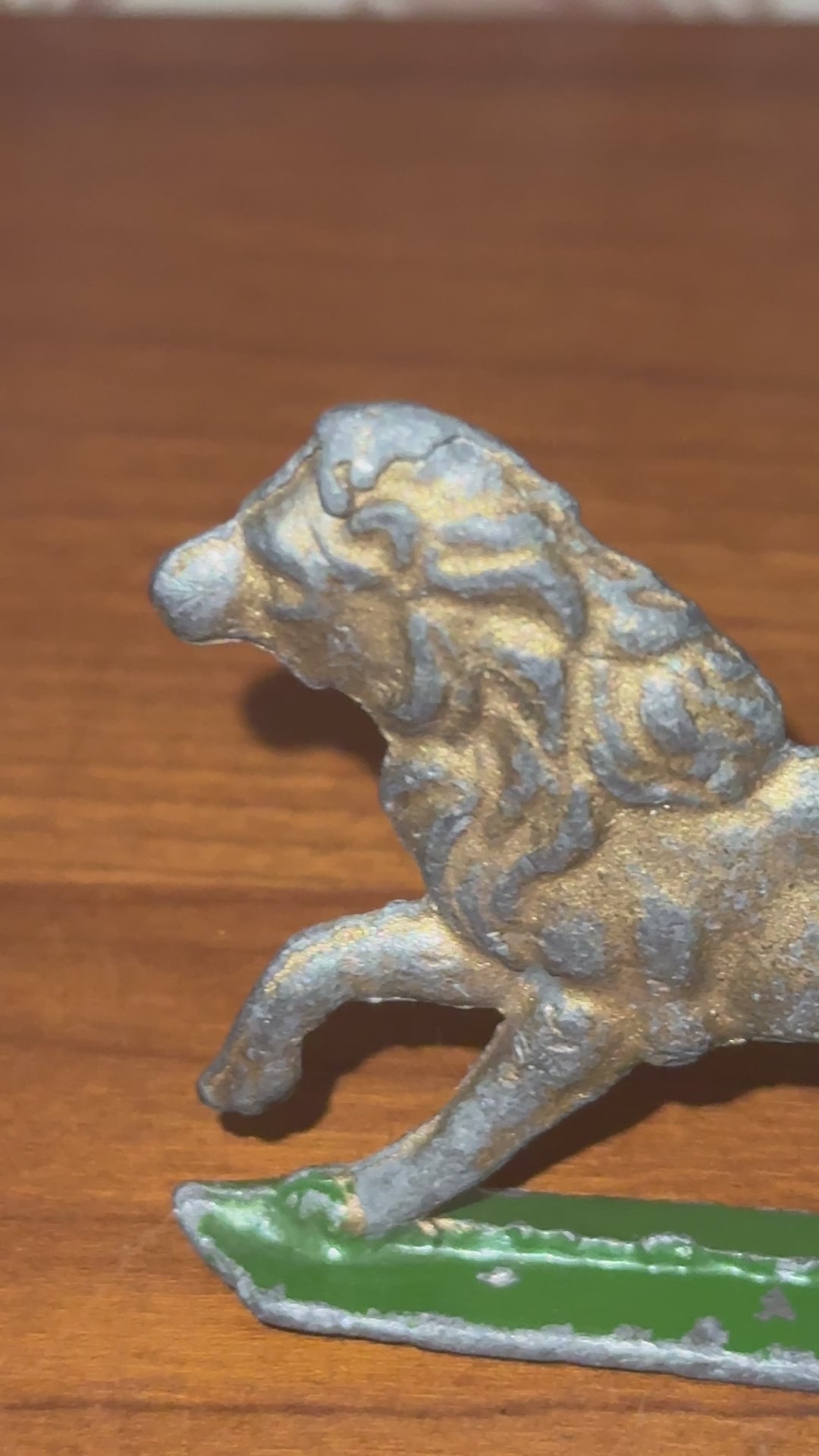 1950s Miniature Flat Silhouette Lion Figurine with Gold Patina on Green Stand