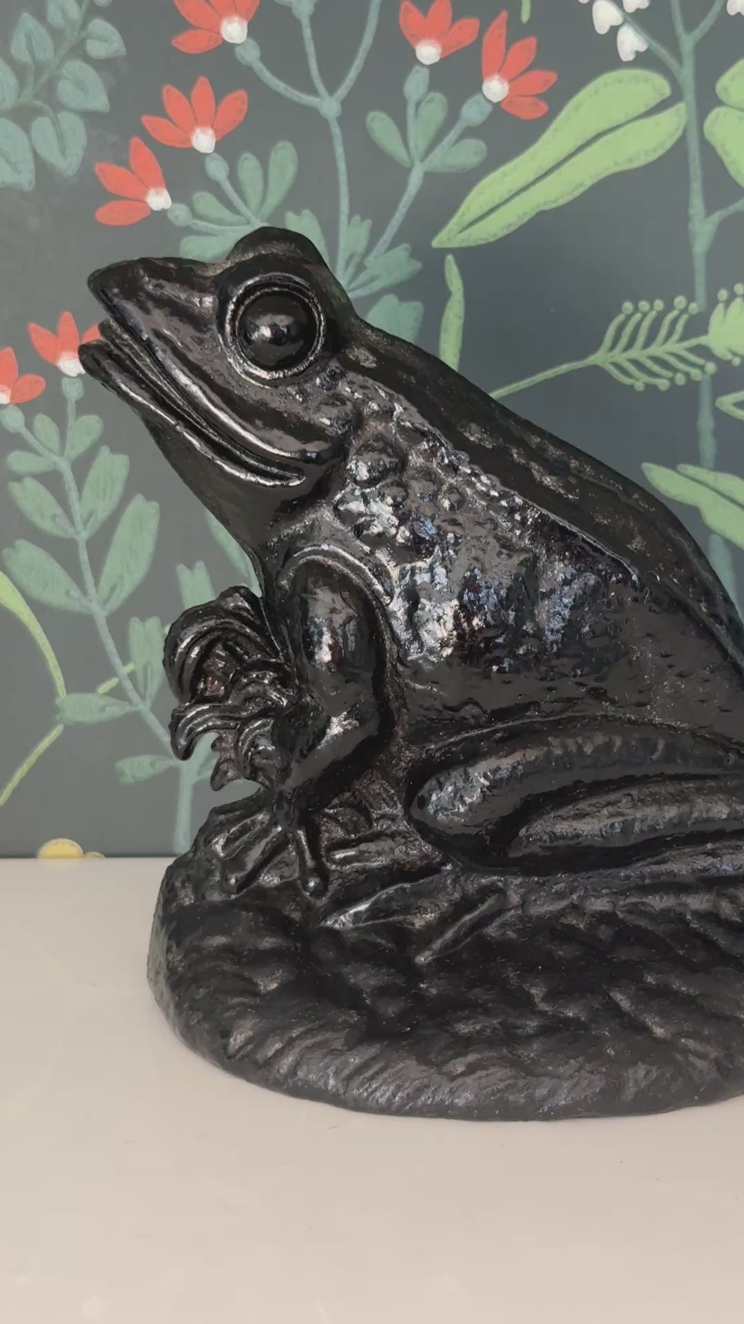 Heavy vintage frog doorstop in black cast iron front display view