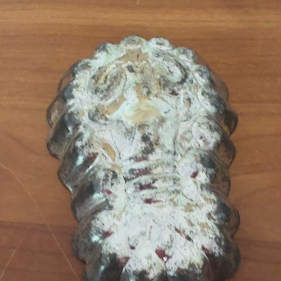 Pair of vintage lobster shaped tinplate moulds with aged metal patina and traditional confectionery design