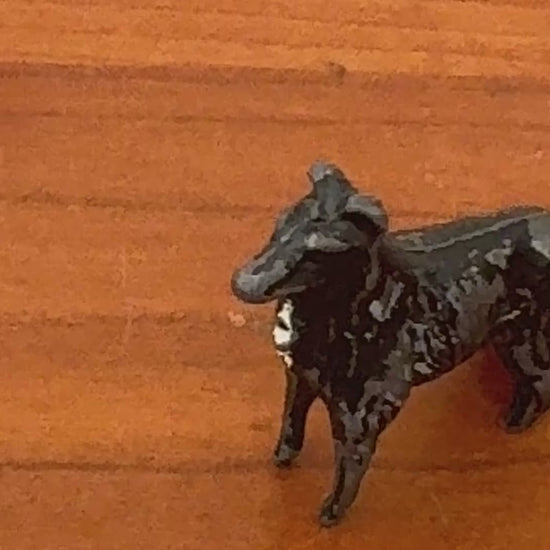 black and white miniature working dog britians lead figurine